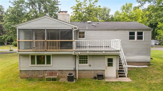 911 Copperkettle Rd, Webster, NY 14580 - rear view of house featuring stairs, a chimney, a yard, a sunroom, and a deck