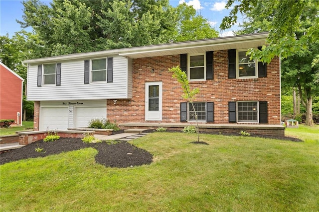 911 Copperkettle Rd, Webster, NY 14580 - bi-level home with a garage, brick siding, and a front lawn
