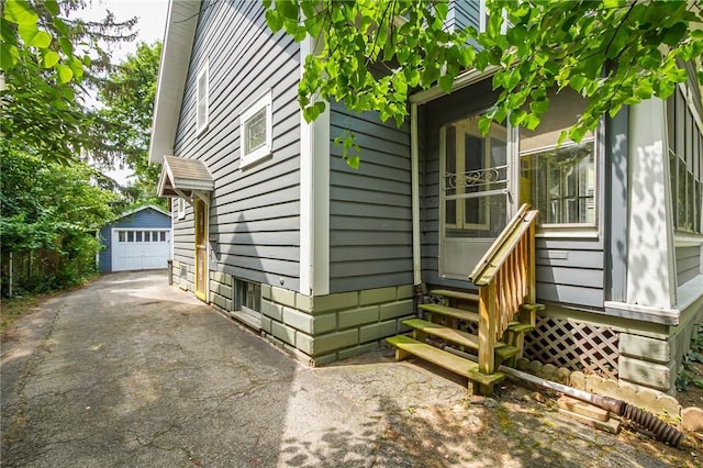 1085 Garson Ave, Rochester, NY 14609 - property entrance with a detached garage