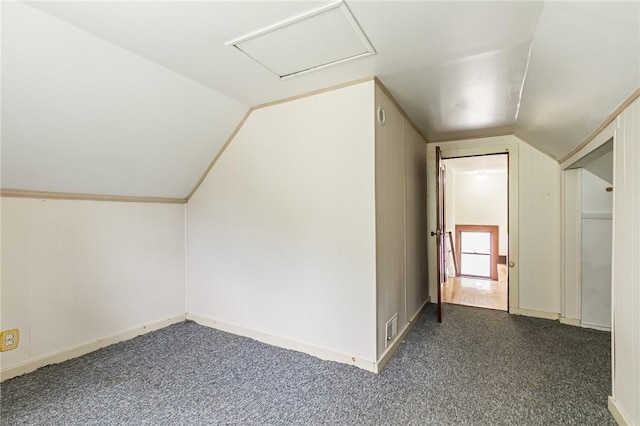 1085 Garson Ave, Rochester, NY 14609 - bonus room with vaulted ceiling, dark colored carpet, and attic access