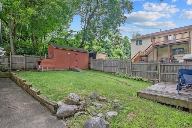 217 Melrose Ave, Camillus, NY 13219 - fenced backyard featuring a deck and a storage shed
