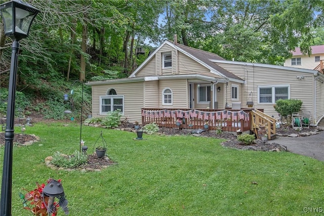 217 Melrose Ave, Camillus, NY 13219 - view of front of house featuring a front yard and a deck