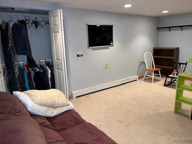 208 Angle Rd, West Seneca, NY 14224 - playroom with a baseboard radiator, carpet flooring, and recessed lighting