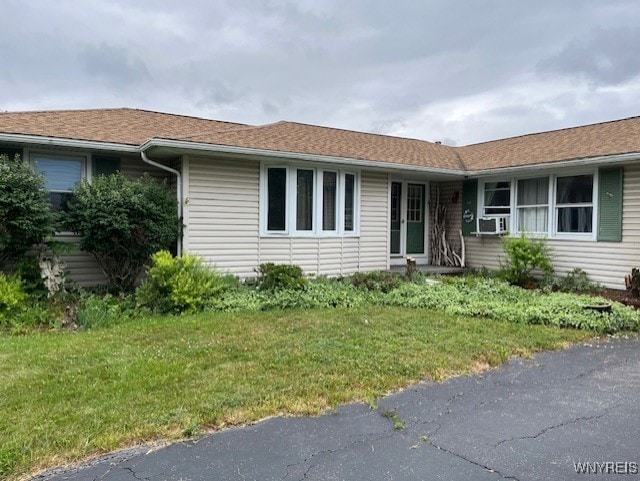 208 Angle Rd, West Seneca, NY 14224 - ranch-style house featuring a front lawn and cooling unit