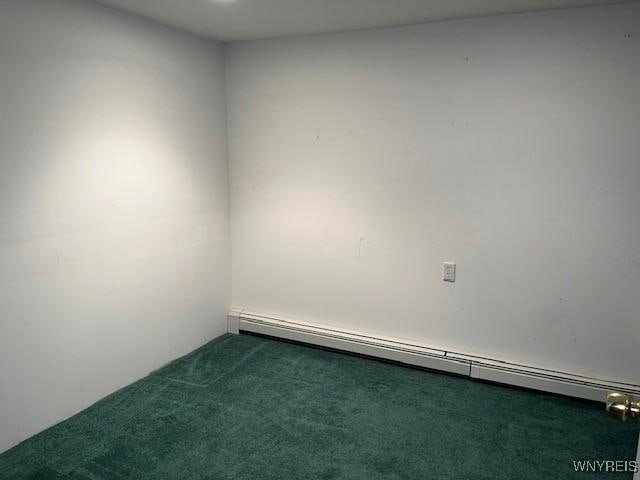 208 Angle Rd, West Seneca, NY 14224 - carpeted spare room featuring a baseboard radiator