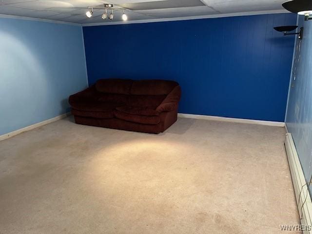 208 Angle Rd, West Seneca, NY 14224 - living area with a baseboard heating unit and carpet flooring
