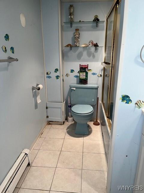 208 Angle Rd, West Seneca, NY 14224 - full bathroom featuring a baseboard heating unit, tile patterned floors, and bath / shower combo with glass door