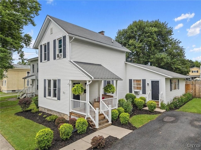 37 Augustus St, Auburn, NY 13021 - traditional-style house featuring a shingled roof and covered porch