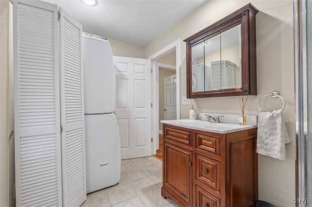 37 Augustus St, Auburn, NY 13021 - bathroom with a closet, vanity, and tile patterned flooring