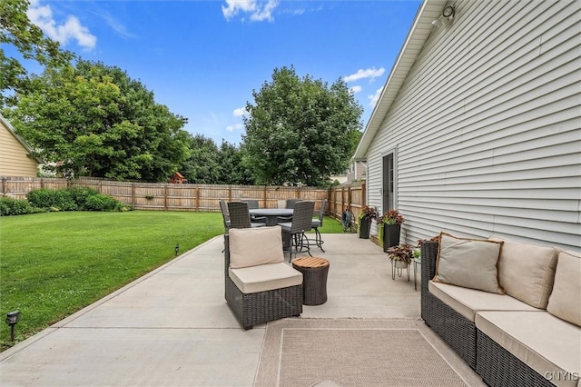 37 Augustus St, Auburn, NY 13021 - fenced backyard with outdoor lounge area, a patio, and outdoor dining area