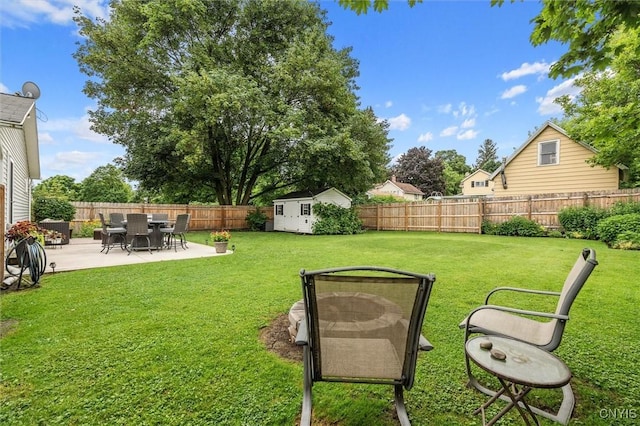 37 Augustus St, Auburn, NY 13021 - fenced backyard with a patio and a storage shed