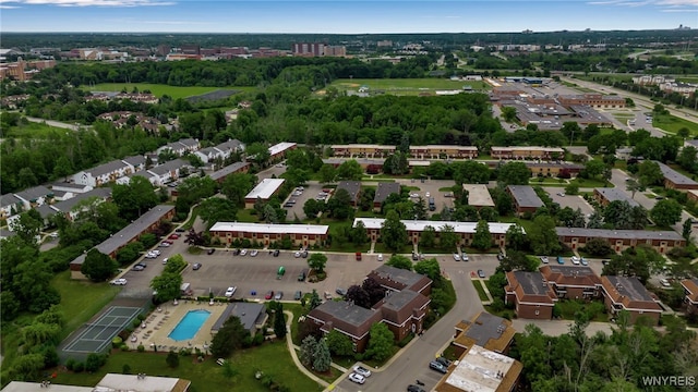 145 Charter Oaks Dr Unit 2, Amherst, NY 14228 - aerial overview of property's location with a pool area and a tree filled landscape