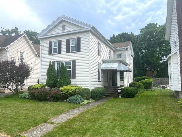 73 Platt St, Hornell, NY 14843 - neoclassical / greek revival house featuring a front lawn