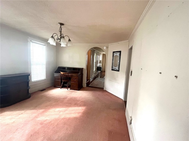 73 Platt St, Hornell, NY 14843 - unfurnished dining area with arched walkways, a chandelier, crown molding, carpet flooring, and a textured ceiling