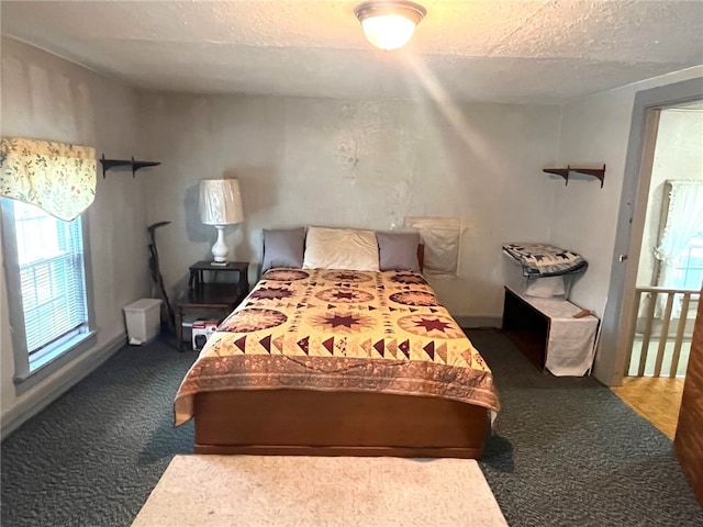 73 Platt St, Hornell, NY 14843 - carpeted bedroom featuring a textured ceiling