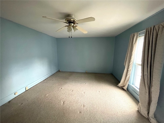73 Platt St, Hornell, NY 14843 - unfurnished room featuring healthy amount of natural light, light colored carpet, and ceiling fan