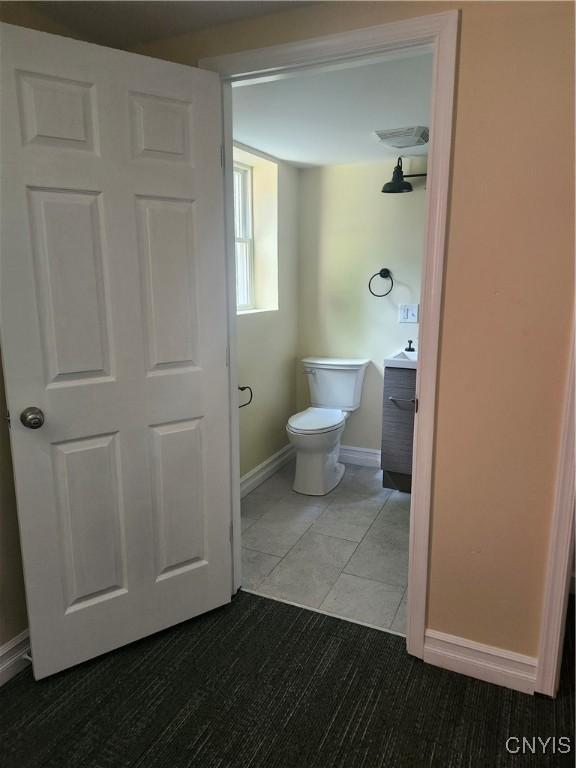 127 Austin Ave, Syracuse, NY 13207 - bathroom with vanity and tile patterned floors