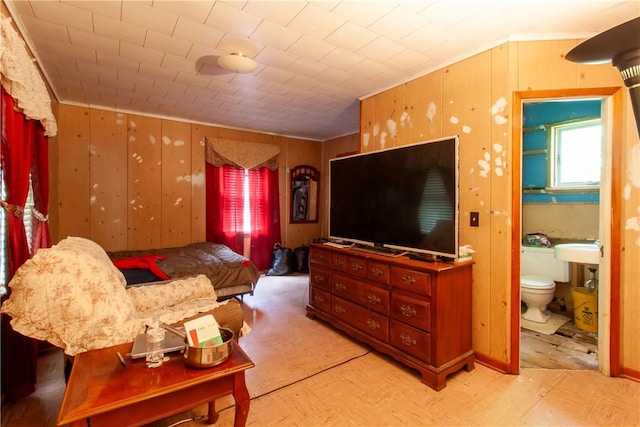 27 E Main St, Sodus, NY 14551 - bedroom featuring crown molding and connected bathroom