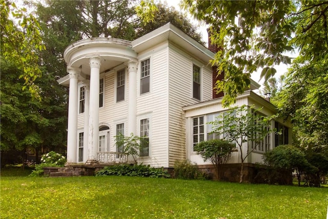 27 E Main St, Sodus, NY 14551 - view of property exterior with a yard