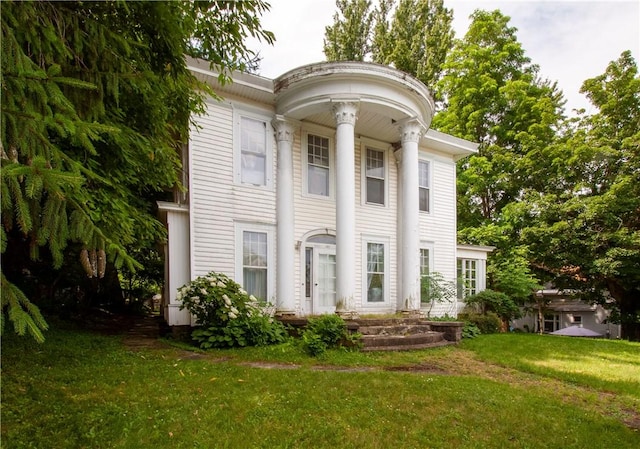 27 E Main St, Sodus, NY 14551 - greek revival inspired property with a front yard