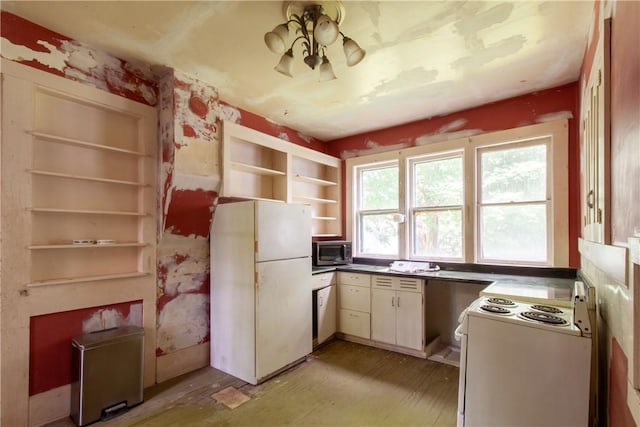 27 E Main St, Sodus, NY 14551 - kitchen featuring white appliances, open shelves, and dark countertops