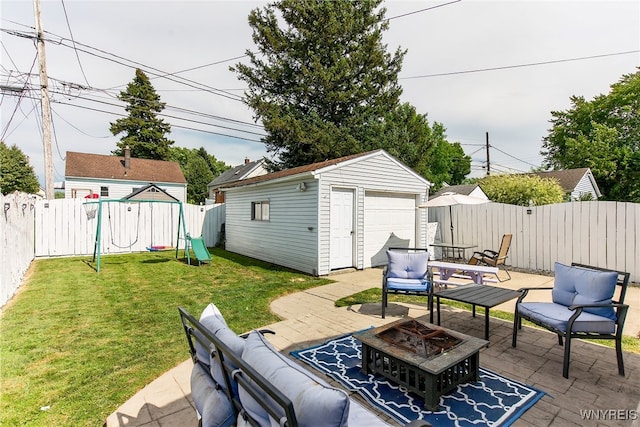 101 Barnsdale Ave, West Seneca, NY 14224 - fenced backyard with a patio, a playground, an outdoor structure, an outdoor living space with a fire pit, and a detached garage