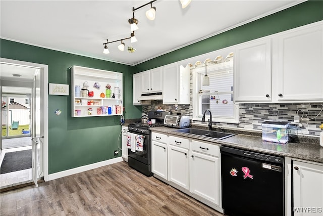 101 Barnsdale Ave, West Seneca, NY 14224 - kitchen with black appliances, dark countertops, under cabinet range hood, white cabinets, and decorative backsplash