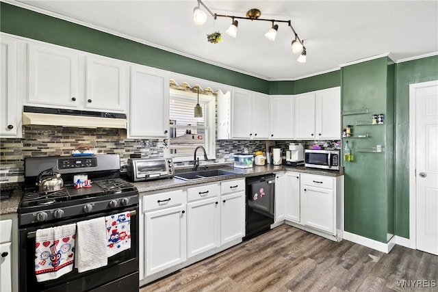 101 Barnsdale Ave, West Seneca, NY 14224 - kitchen featuring gas range oven, dishwasher, under cabinet range hood, stainless steel microwave, and white cabinetry
