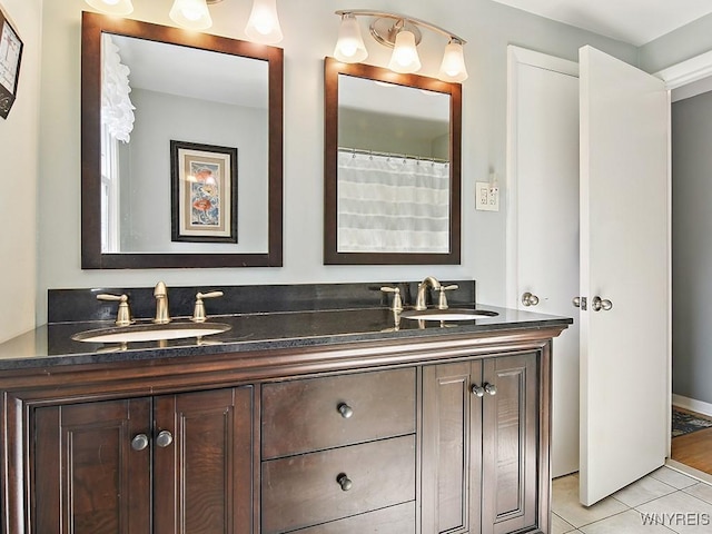149 Ava Ln, Amherst, NY 14221 - bathroom with double vanity and tile patterned floors
