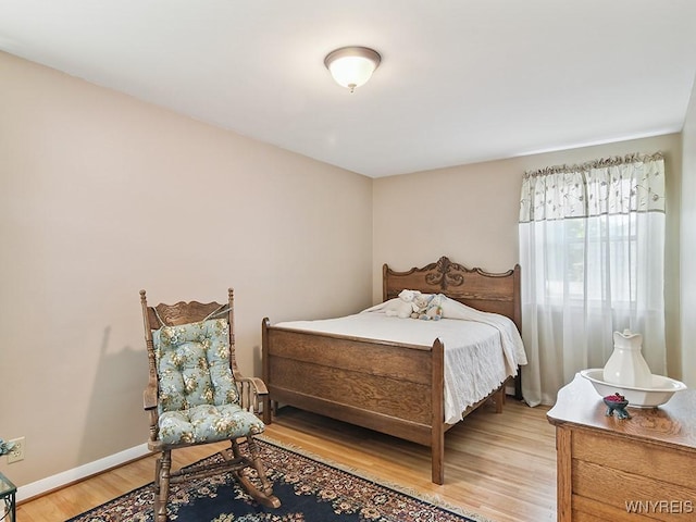 149 Ava Ln, Amherst, NY 14221 - bedroom with wood finished floors and baseboards