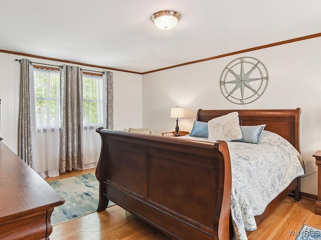 149 Ava Ln, Amherst, NY 14221 - bedroom with light wood-style flooring and ornamental molding