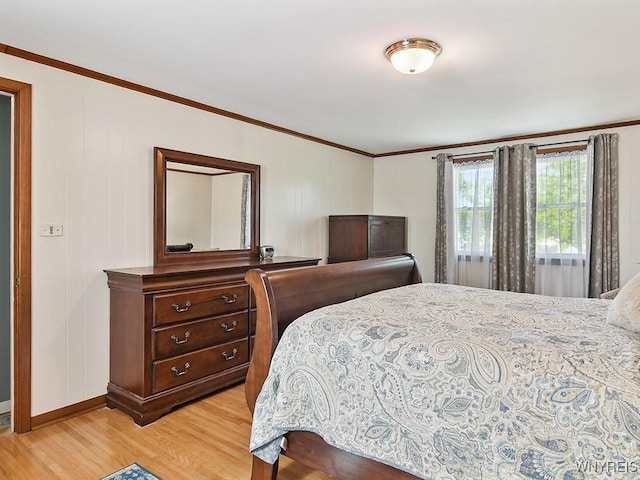 149 Ava Ln, Amherst, NY 14221 - bedroom featuring light wood-style flooring and crown molding