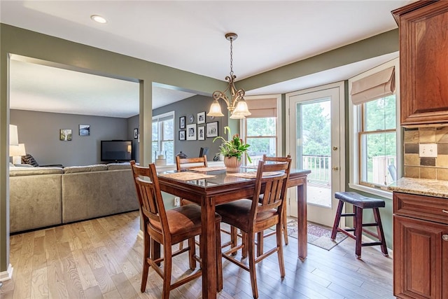 15 Chesapeake Lndg, Henrietta, NY 14586 - dining room with light wood-style flooring, recessed lighting, and a chandelier