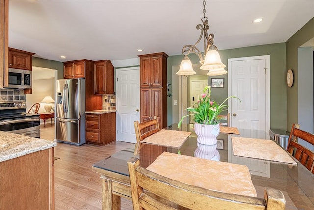 15 Chesapeake Lndg, Henrietta, NY 14586 - dining area featuring recessed lighting and light wood-type flooring