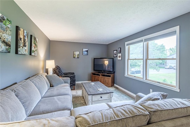 15 Chesapeake Lndg, Henrietta, NY 14586 - living room featuring carpet floors and a textured ceiling
