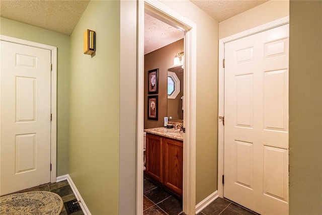 15 Chesapeake Lndg, Henrietta, NY 14586 - hall with a textured ceiling and baseboards