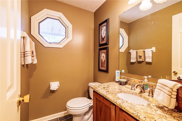 15 Chesapeake Lndg, Henrietta, NY 14586 - half bath with vanity and a textured ceiling