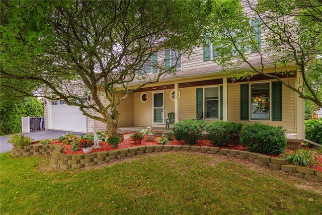 15 Chesapeake Lndg, Henrietta, NY 14586 - view of front facade with a porch, a front lawn, and asphalt driveway