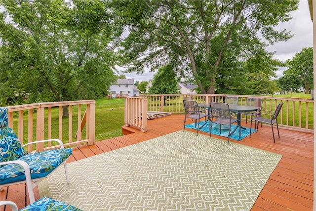 15 Chesapeake Lndg, Henrietta, NY 14586 - wooden deck featuring outdoor dining area and a lawn