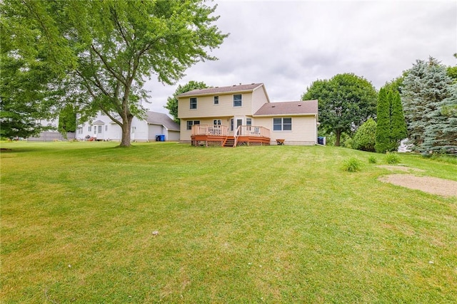 15 Chesapeake Lndg, Henrietta, NY 14586 - rear view of house featuring a deck and a yard
