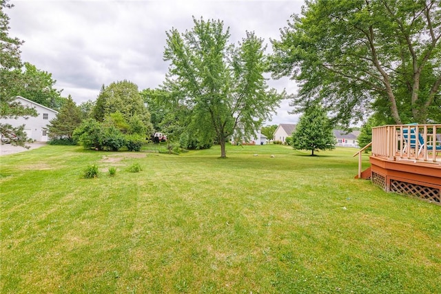 15 Chesapeake Lndg, Henrietta, NY 14586 - view of grassy yard with a deck