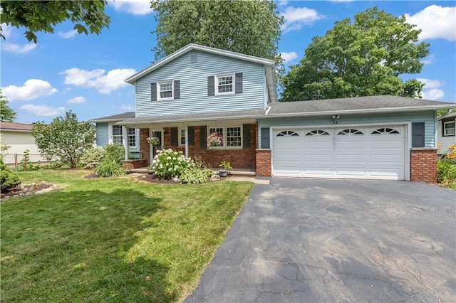99 Dorian Ln, Greece, NY 14626 - traditional-style home with asphalt driveway, brick siding, an attached garage, a front lawn, and a porch