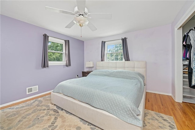 99 Dorian Ln, Greece, NY 14626 - bedroom featuring a closet, wood finished floors, and ceiling fan