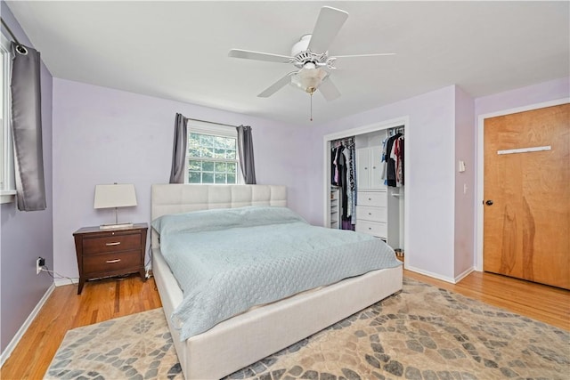 99 Dorian Ln, Greece, NY 14626 - bedroom with light wood finished floors, a closet, and ceiling fan