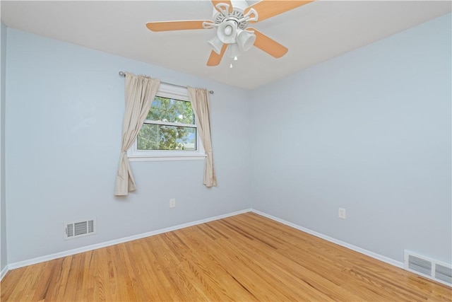 99 Dorian Ln, Greece, NY 14626 - unfurnished room with wood finished floors and a ceiling fan
