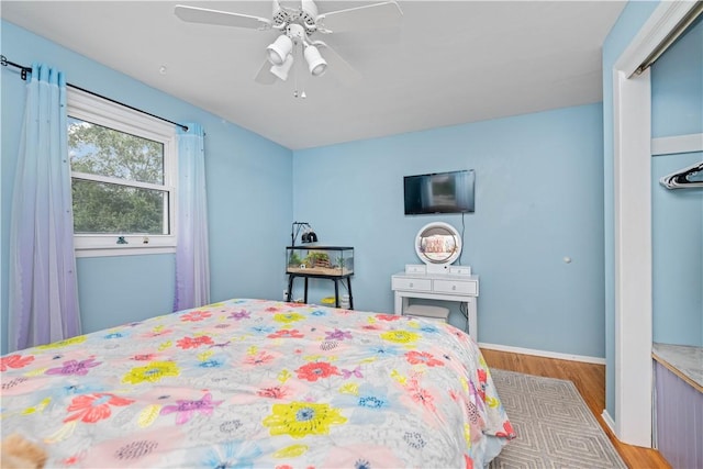 99 Dorian Ln, Greece, NY 14626 - bedroom with wood finished floors and ceiling fan