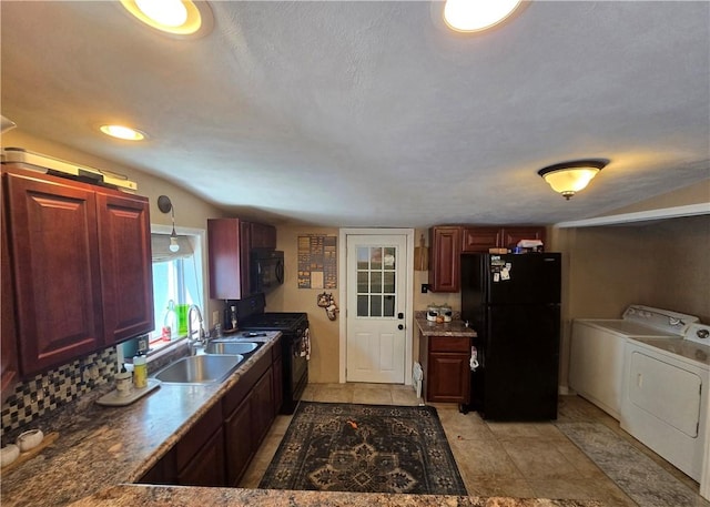 37 Pulaski St, Auburn, NY 13021 - kitchen featuring black appliances, washing machine and clothes dryer, lofted ceiling, and dark brown cabinets