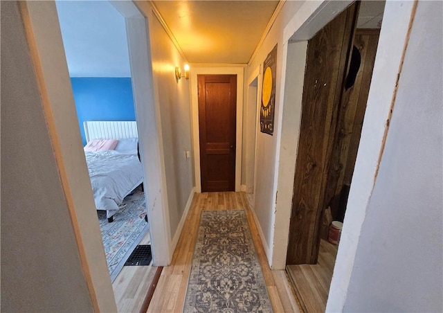 37 Pulaski St, Auburn, NY 13021 - corridor featuring wood finished floors and ornamental molding