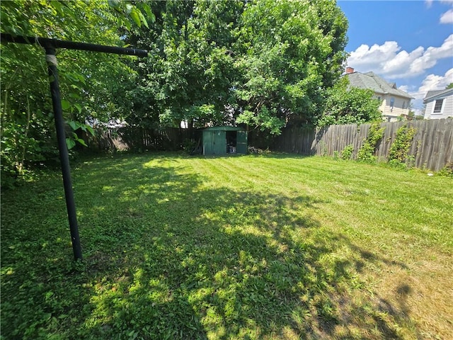 37 Pulaski St, Auburn, NY 13021 - fenced backyard with a shed