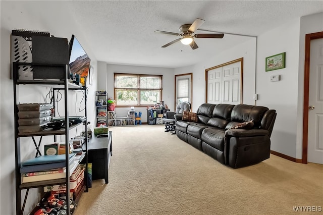 3 Keph Dr Unit 3, Amherst, NY 14228 - living room with carpet flooring, ceiling fan, and a textured ceiling